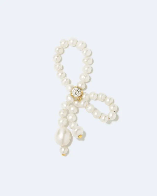 Completedworks The Tender Grip bague perle zircone dorée