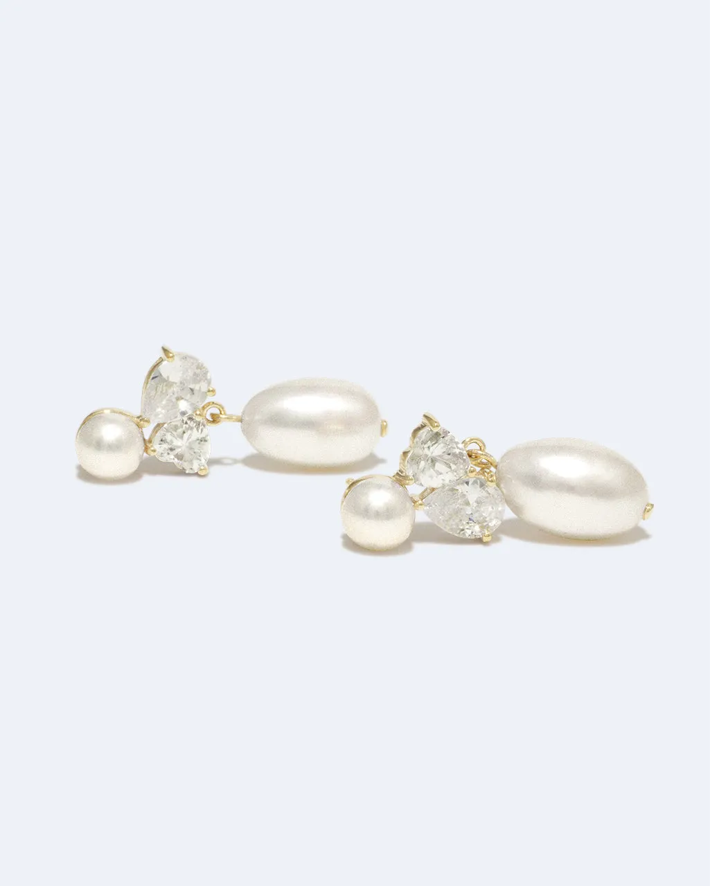 Completedworks Infinity's Reversal boucles d'oreilles perles zirconia vermeil