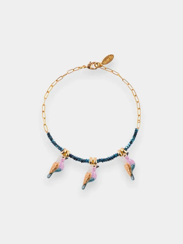 Nach Bijoux bracelet perles d'hématite et oiseaux porcelaine