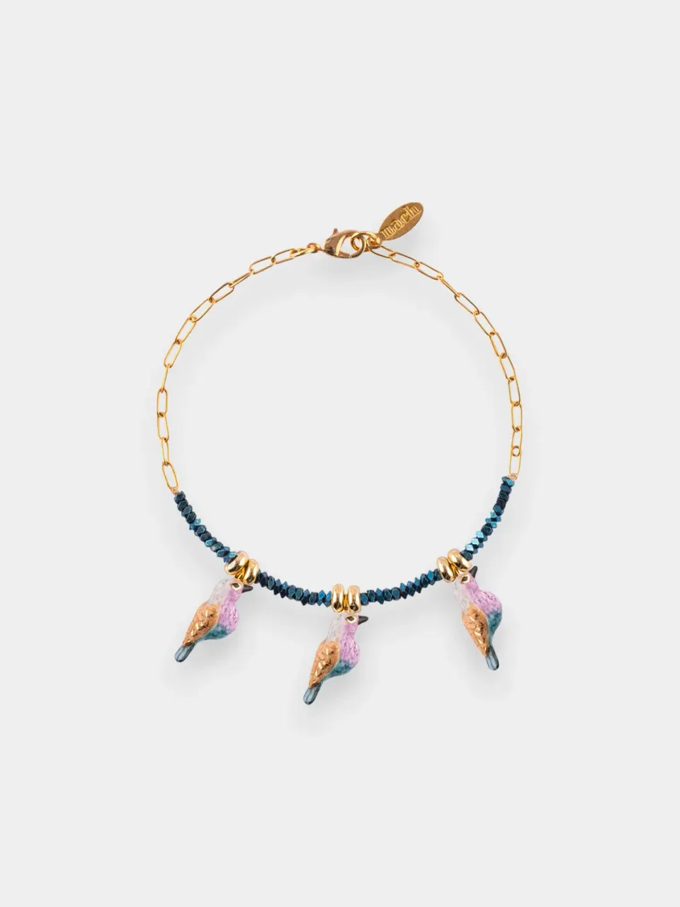Nach Bijoux bracelet perles d'hématite et oiseaux porcelaine