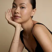 Astrid & Miyu Diamond Wave Charm Studs or massif