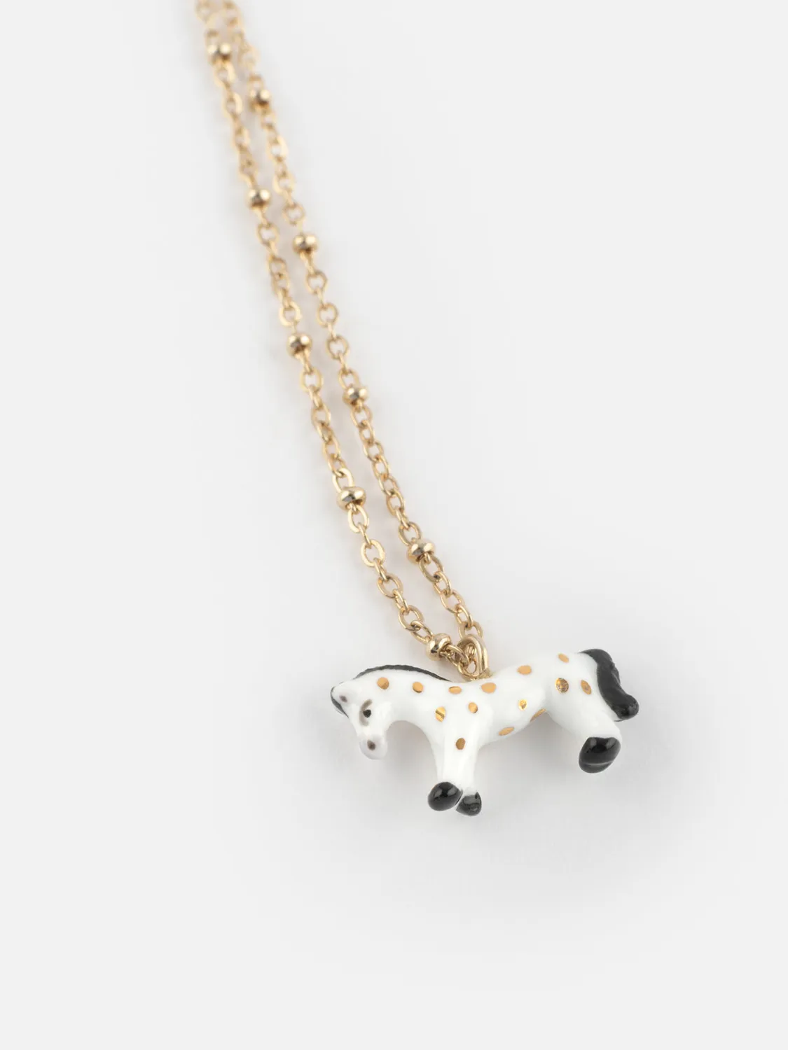 Nach Bijoux cheval blanc collier porcelaine 41 cm doré