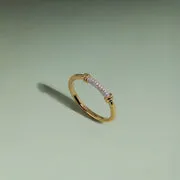 Astrid & Miyu Pavé Knot bague dorée noeud pavé