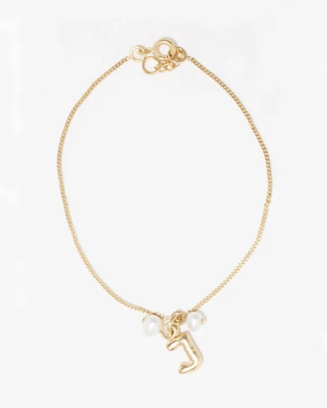 Completedworks Classicworks J bracelet perle doré