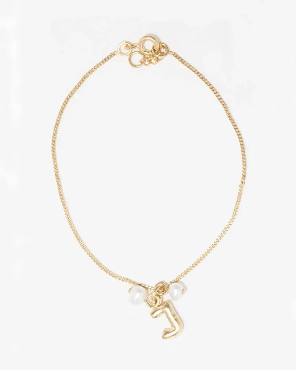 Completedworks Classicworks J bracelet perle doré