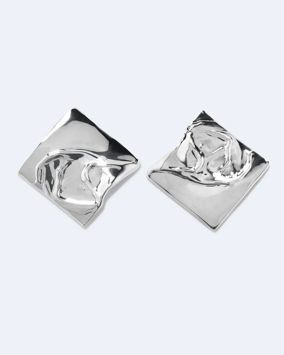 Completedworks Overthinking boucles d’oreilles argent