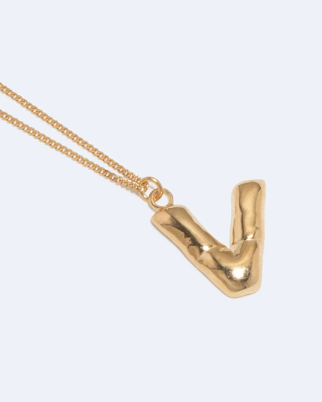 Completedworks Classicworks V collier lettre V plaqué or