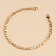 Astrid & Miyu Heart Bezel Tennis bracelet doré cœurs