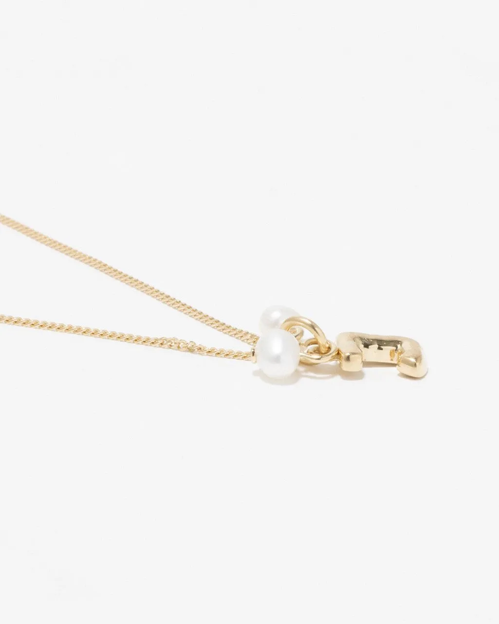 Completedworks Classicworks J bracelet perle doré