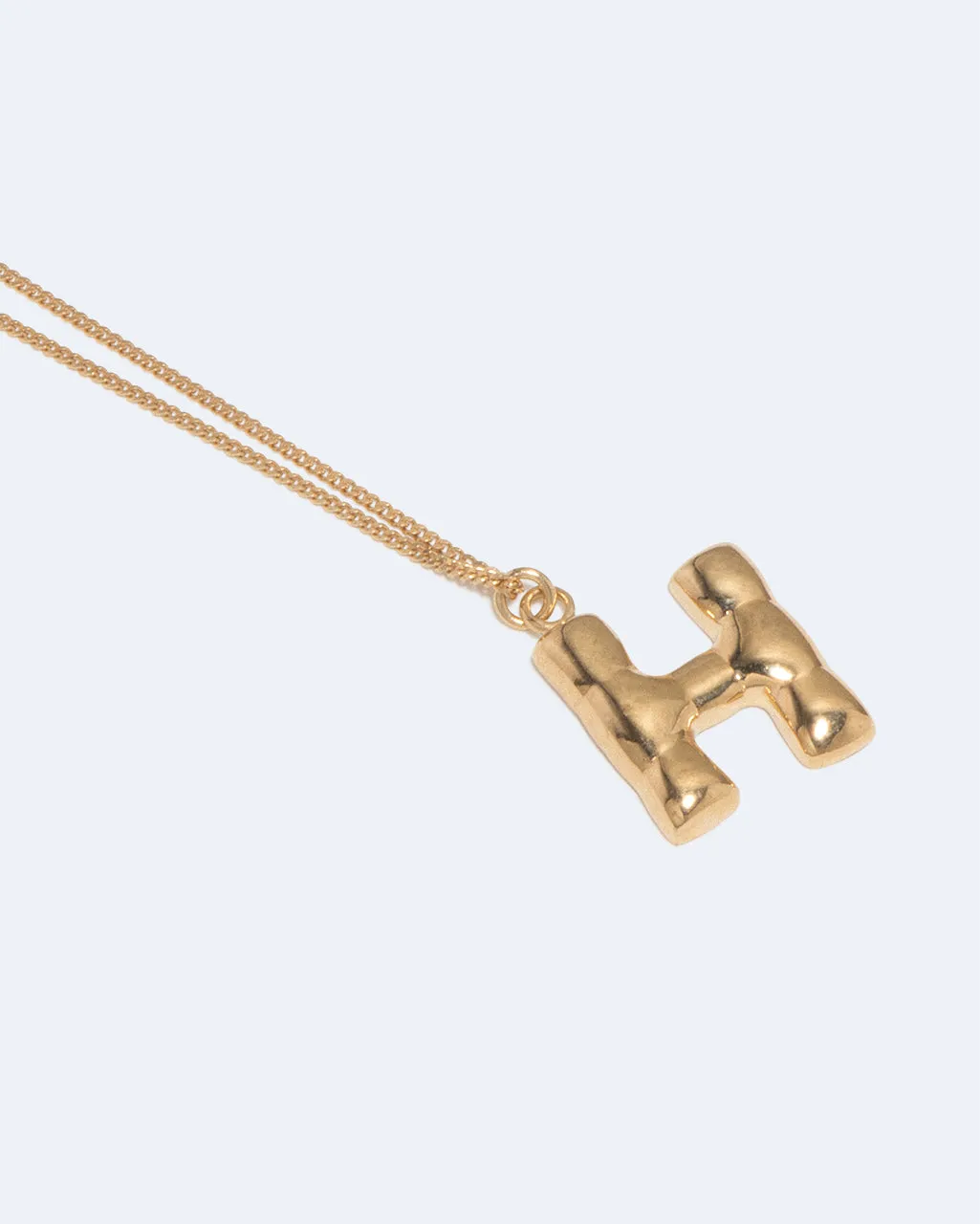 Completedworks Classicworks H collier lettre plaqué or
