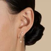 Astrid & Miyu Diamond Wave Charm Studs or massif