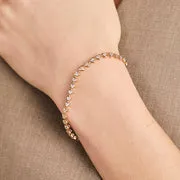 Astrid & Miyu Heart Bezel Tennis bracelet doré cœurs